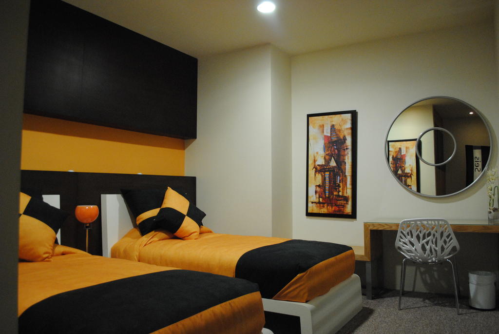 Hotel Centinela Grand Arandas Quarto foto